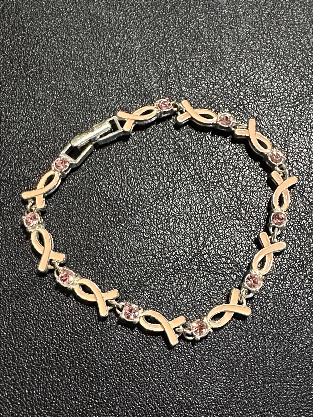 120.  Avon Pink Enamel Ribbon & Punk Rhinestone Silver Tone Bracelet